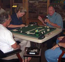Patrons playing a game of dominos
